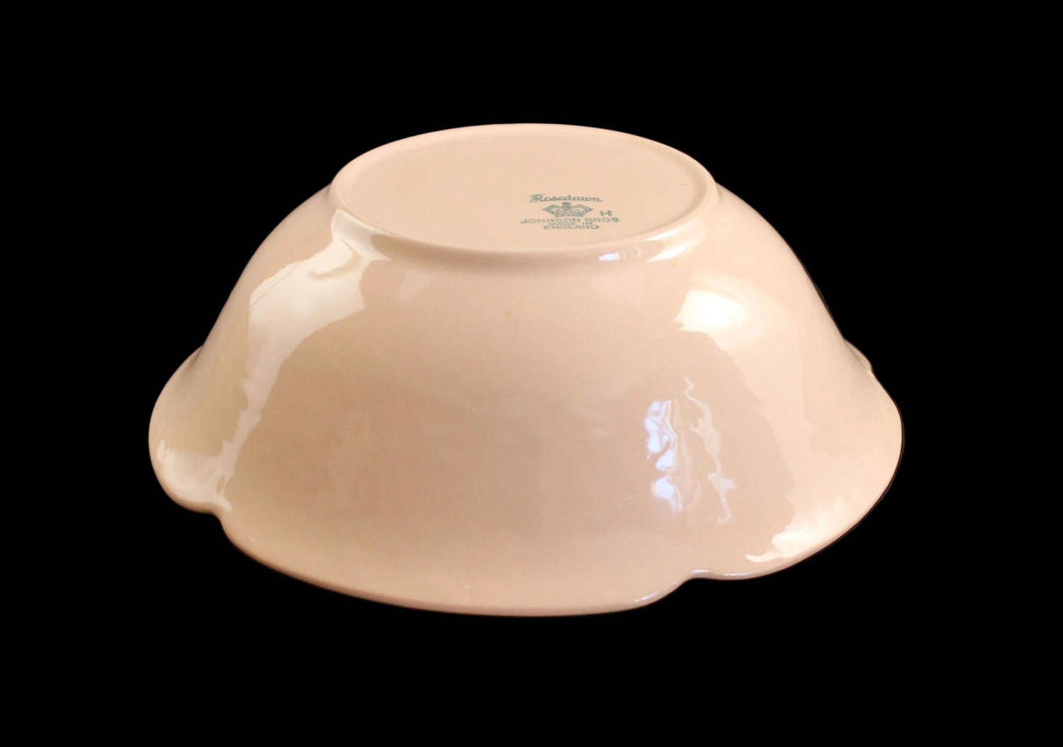 Rose ceramic bowl on a black background