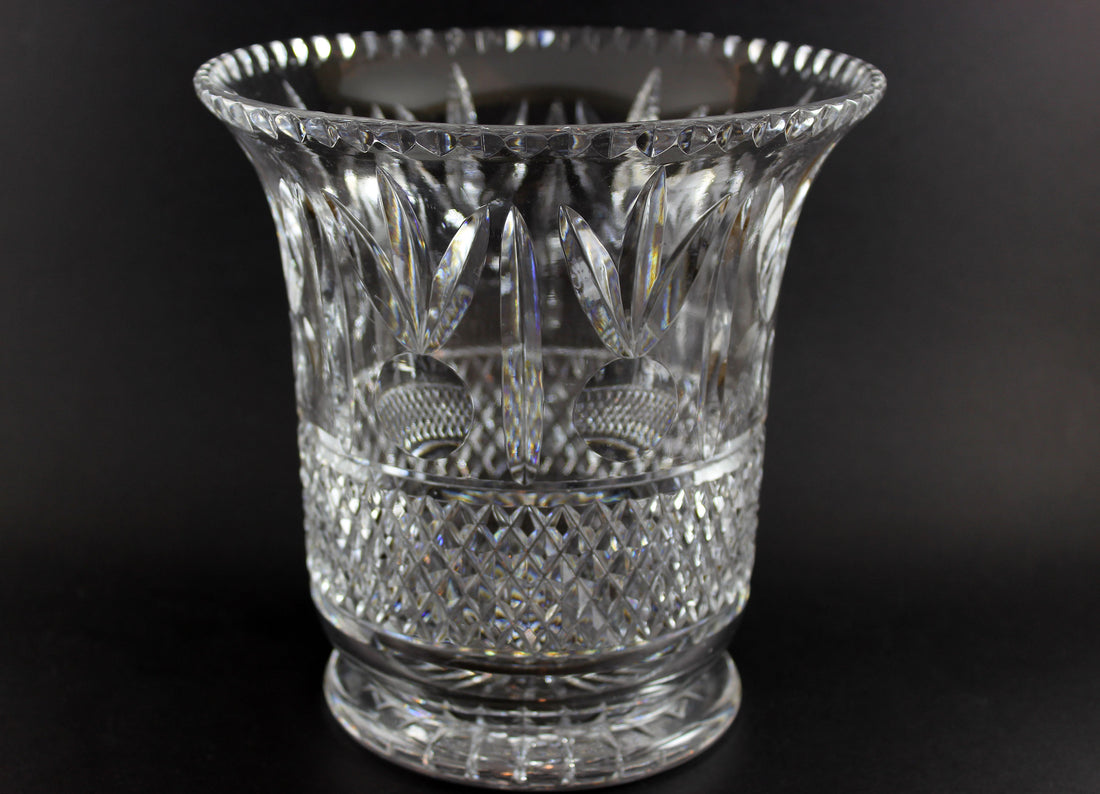 Large Crystal vase or bowl with intricate cut patterns on a black background