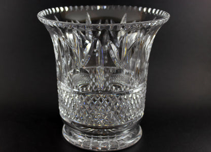 Large Crystal vase or bowl with intricate cut patterns on a black background