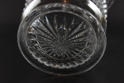 Large Crystal vase or bowl with intricate cut patterns on a black background