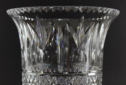 Large Crystal vase or bowl with intricate cut patterns on a black background