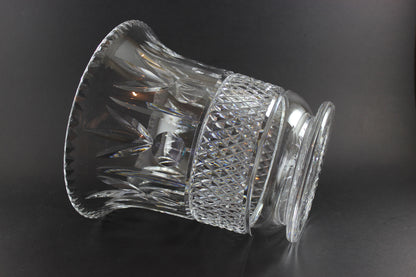 Large Crystal vase or bowl with intricate cut patterns on a black background