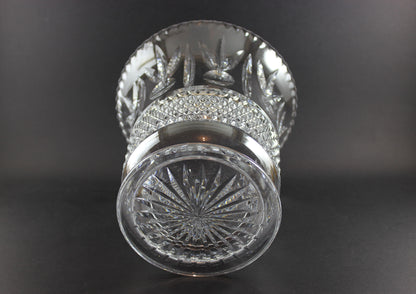 Large Crystal vase or bowl with intricate cut patterns on a black background