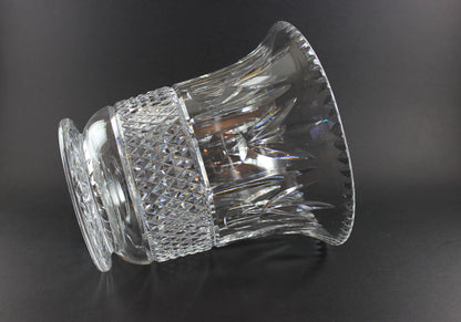 Large Crystal vase or bowl with intricate cut patterns on a black background