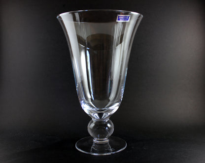 Clear Waterford crystal vase on a black background