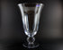 Clear Waterford crystal vase on a black background