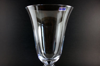 Clear Waterford crystal vase on a black background