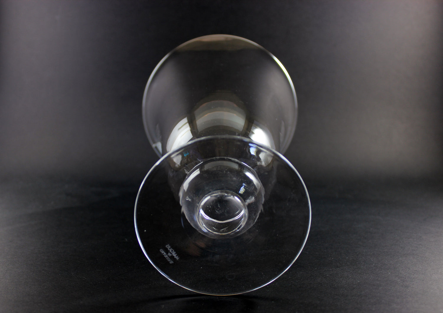 Clear Waterford crystal vase on a black background