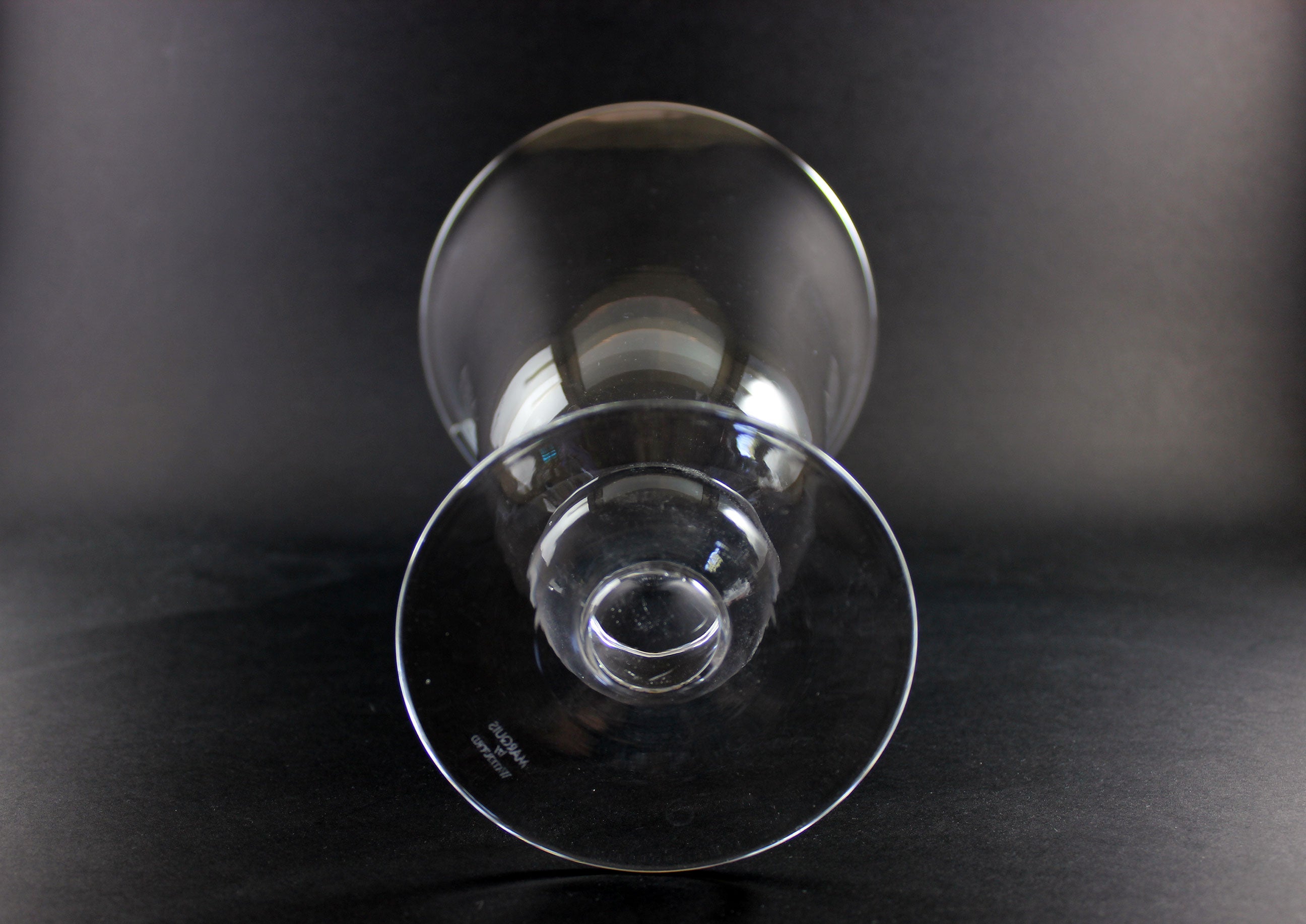 Clear Waterford crystal vase on a black background