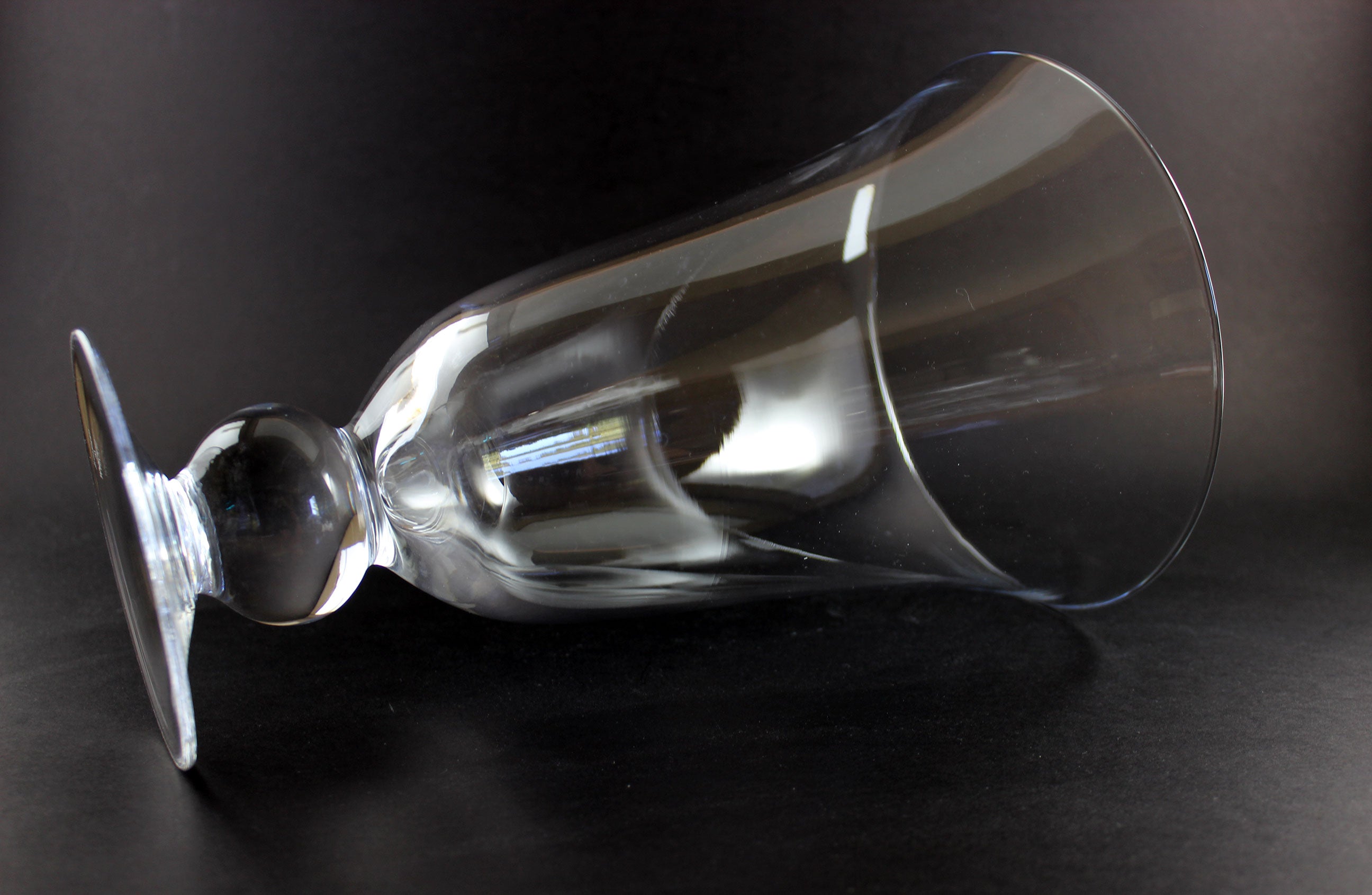 Clear Waterford crystal vase on a black background