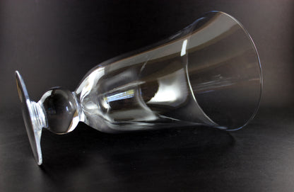 Clear Waterford crystal vase on a black background