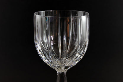 Clear glass goblet on a black background