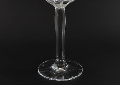 Clear glass stemware on a black background