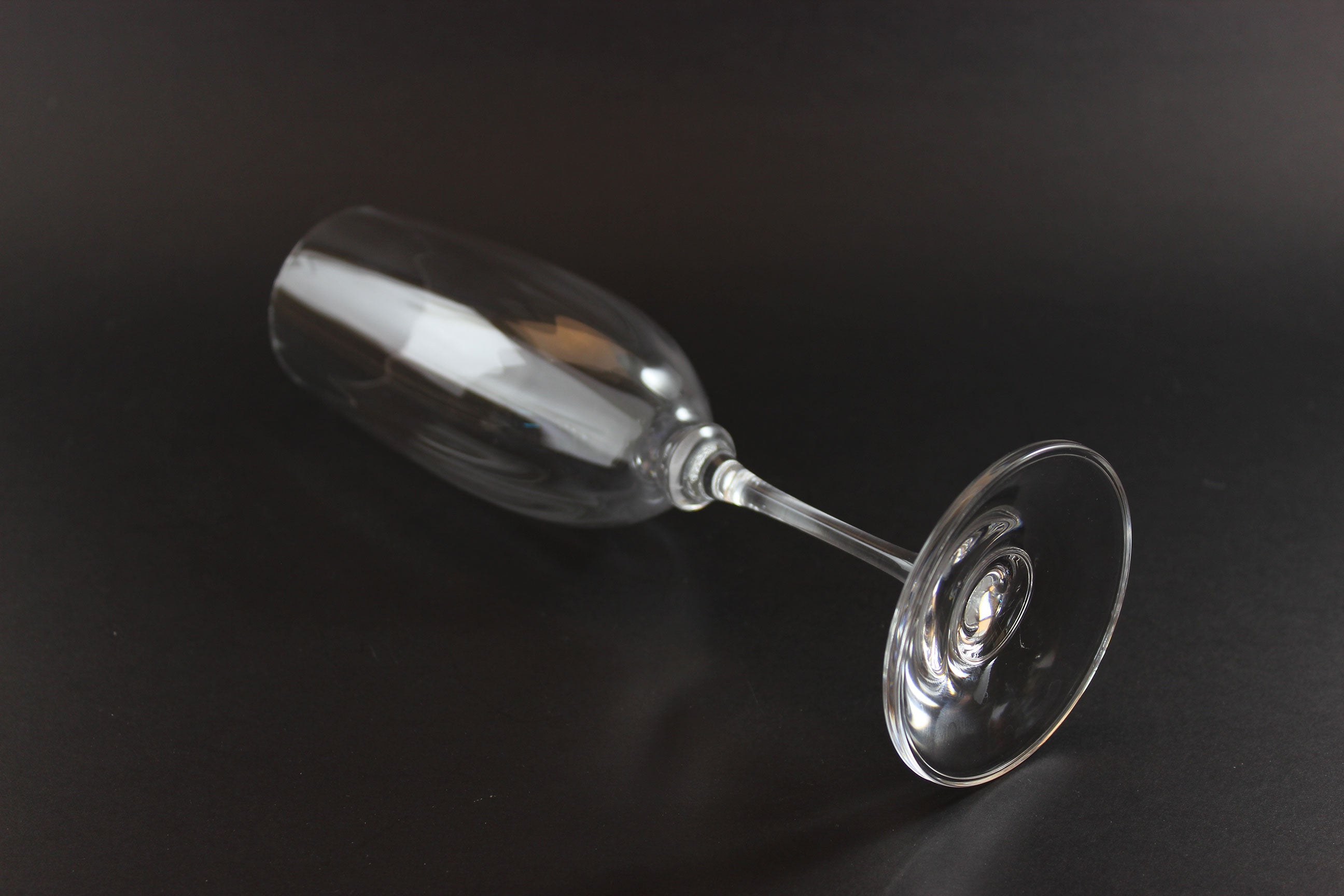 Mikasa Stephanie Pattern clear champagne flute on a black background
