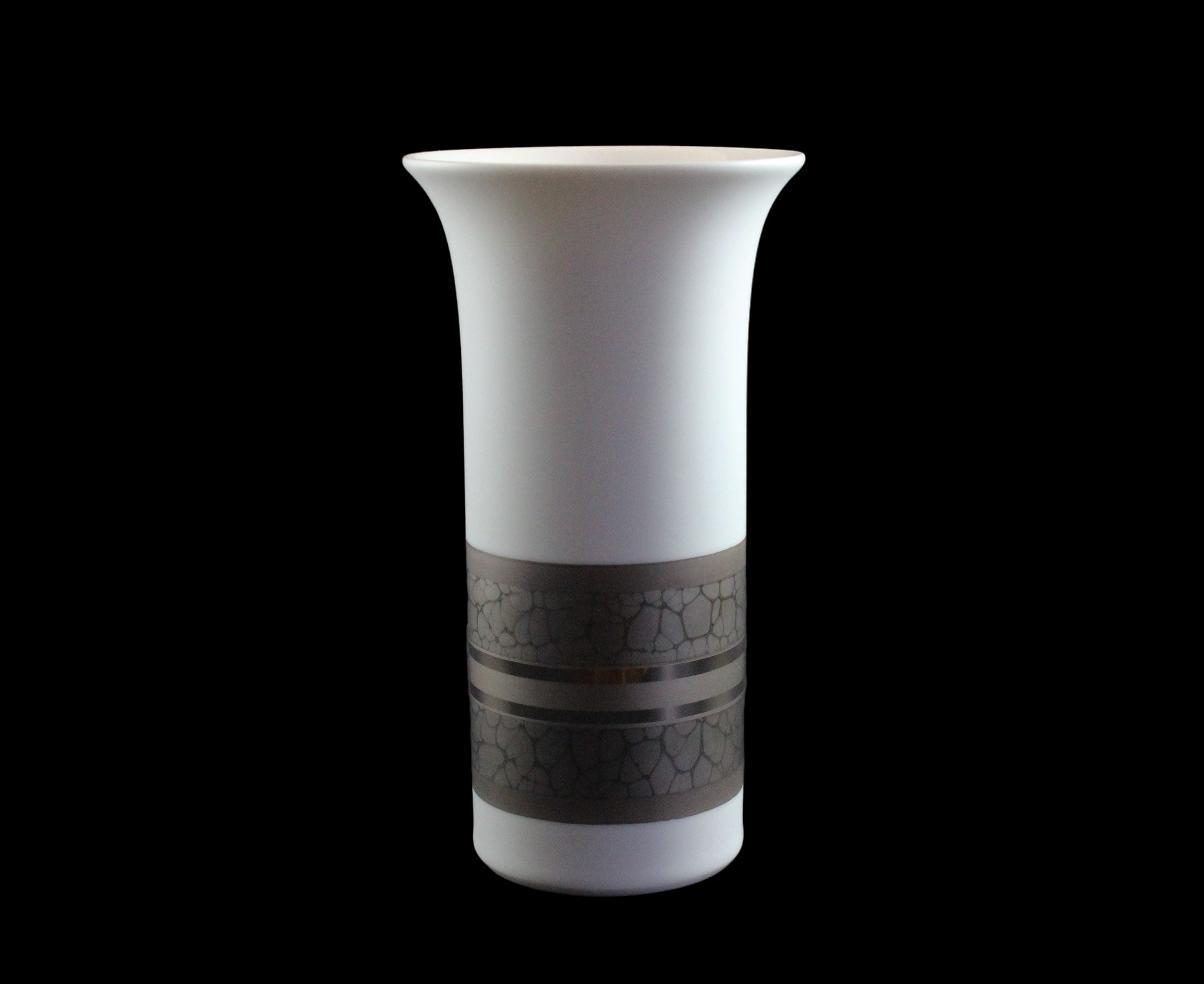 White porcelain Rosenthal vase with platinum and gold embellishments.