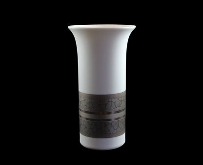 White porcelain Rosenthal vase with platinum and gold embellishments.