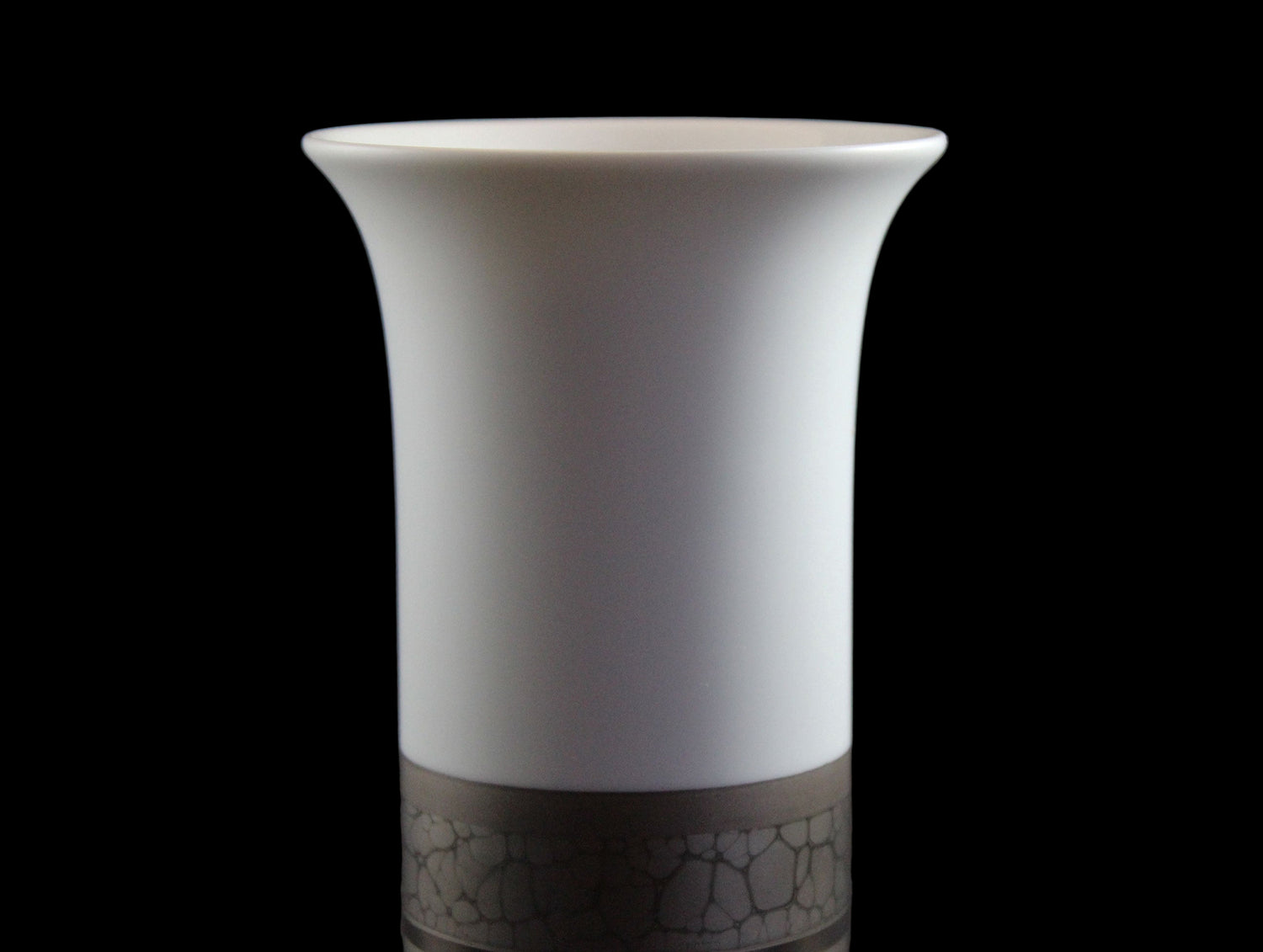 White porcelain Rosenthal vase with platinum and gold embellishments.