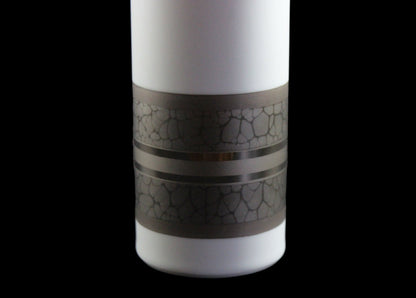 White porcelain Rosenthal vase with platinum and gold embellishments.