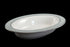 Royal Worcester Bridal Rose oval bowl with blue grey band and silver rims on a black background