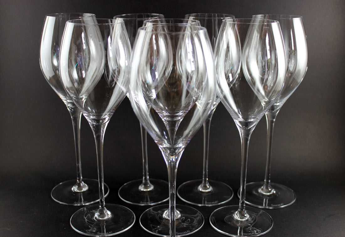 Set of clear wine glasses a dark background