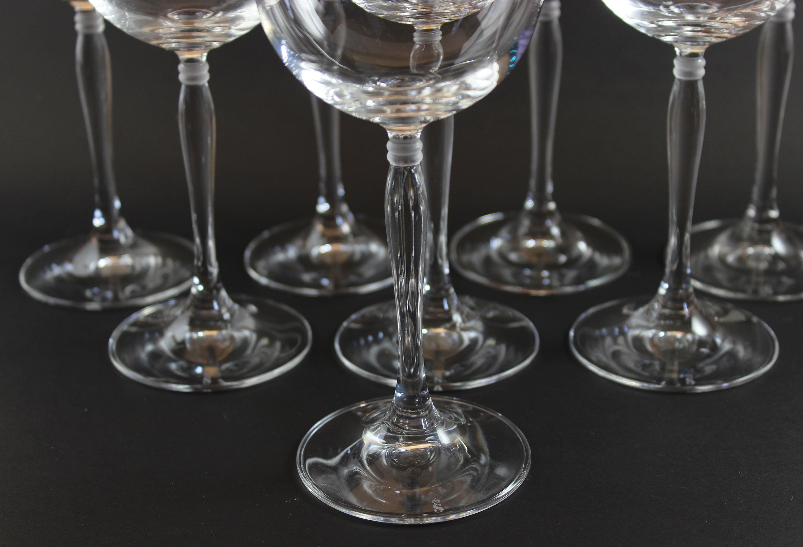 Set of Spiegelau Arabeske clear wine glasses on a dark background