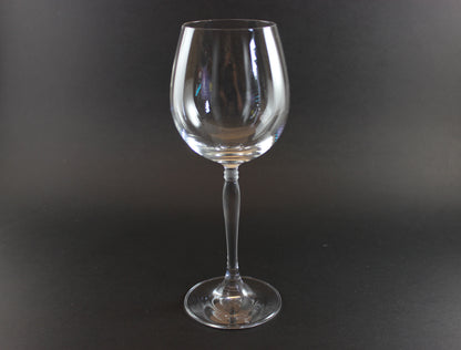 Set of Spiegelau Arabeske clear wine glasses on a dark background