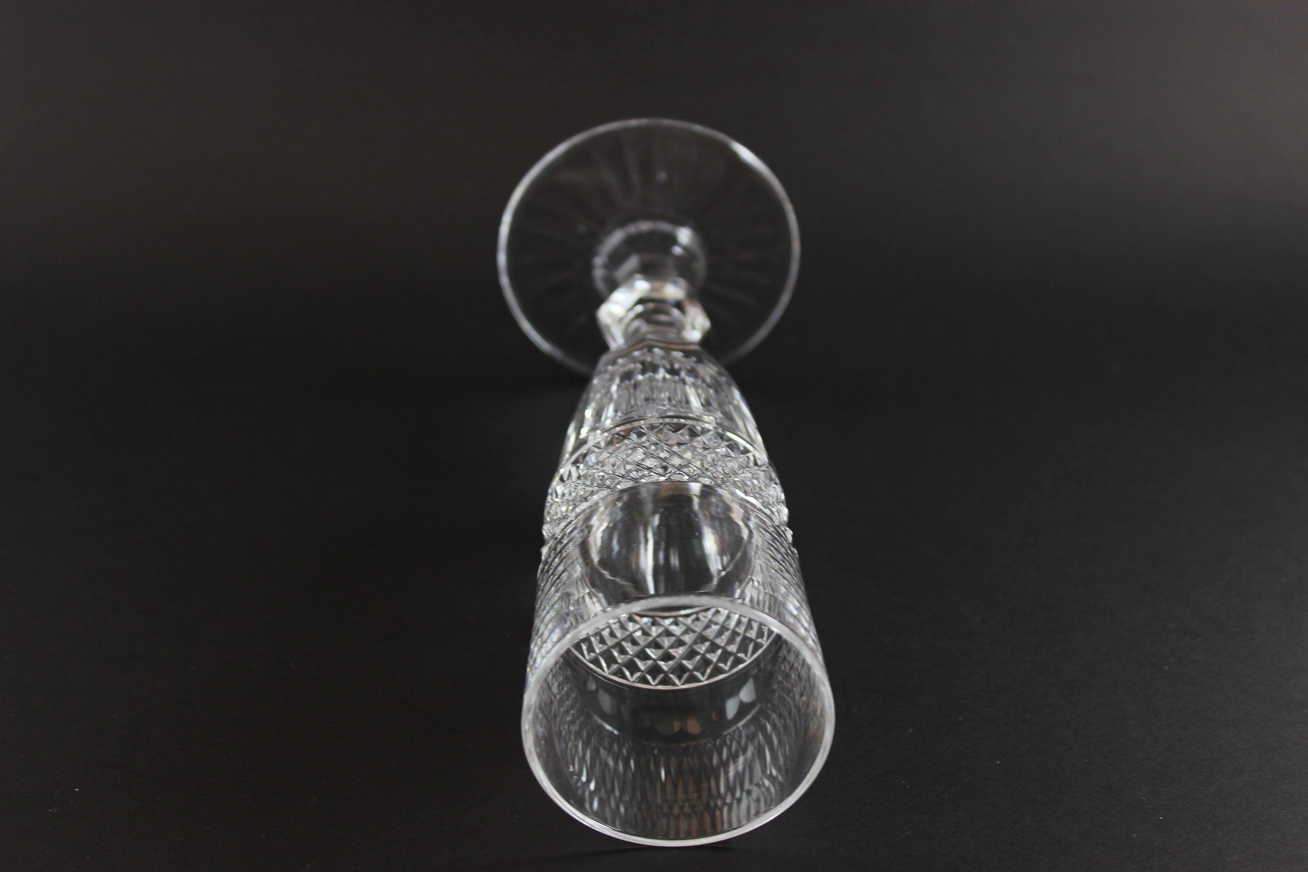 Clear crystal Champagne flute on a black background