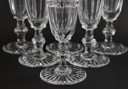 Set of crystal wine glasses on a black background