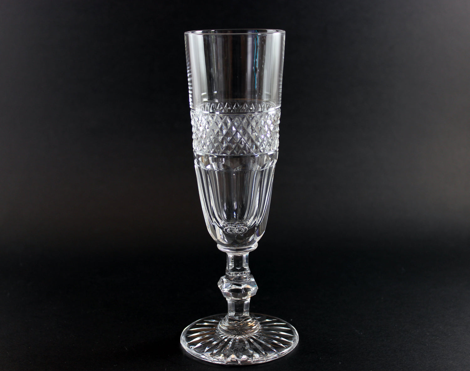 Clear crystal Champagne flute on a black background