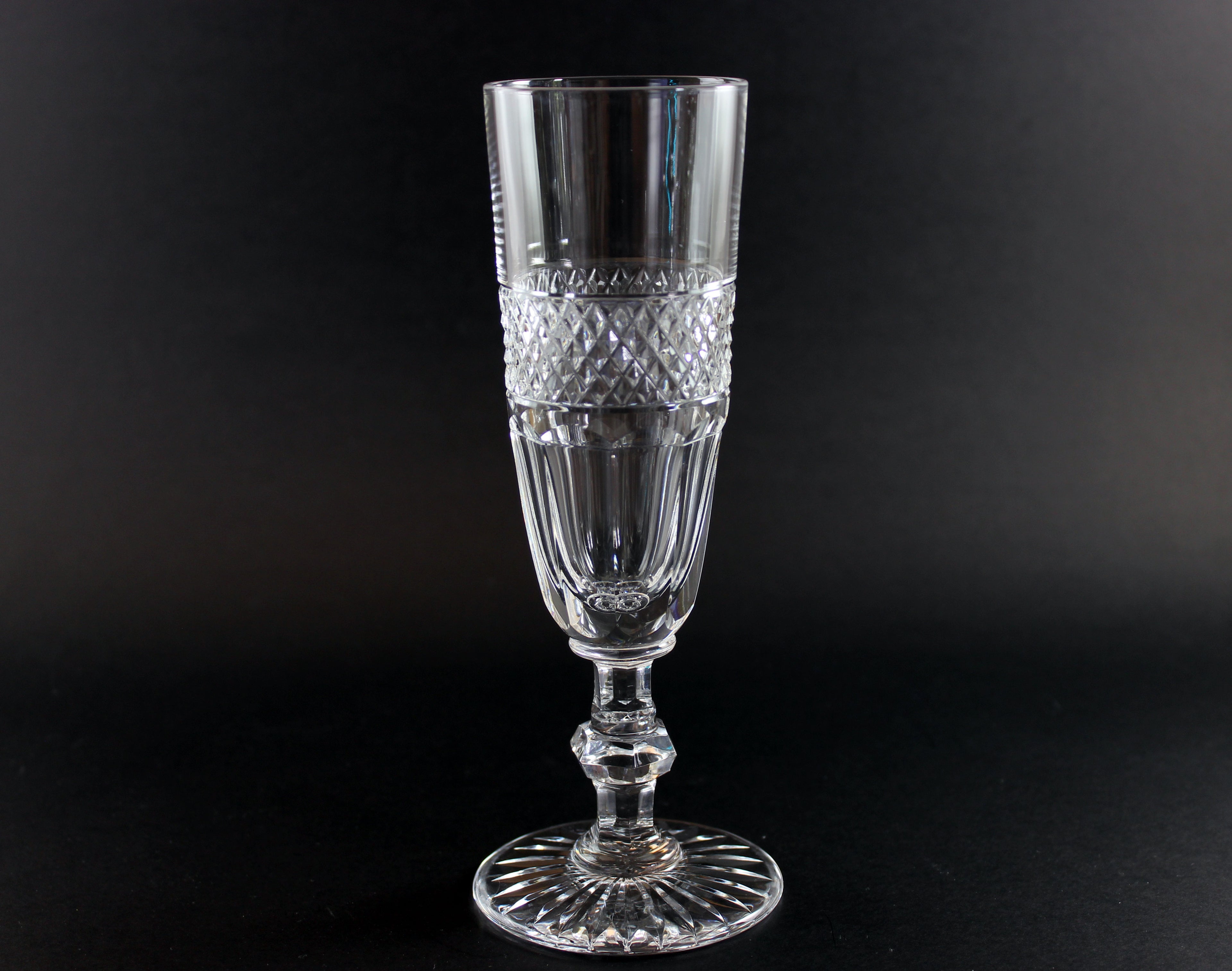 Clear crystal Champagne flute on a black background
