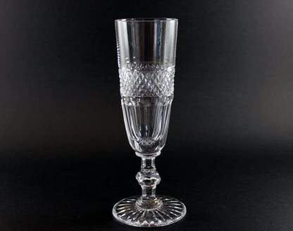 Clear crystal Champagne flute on a black background