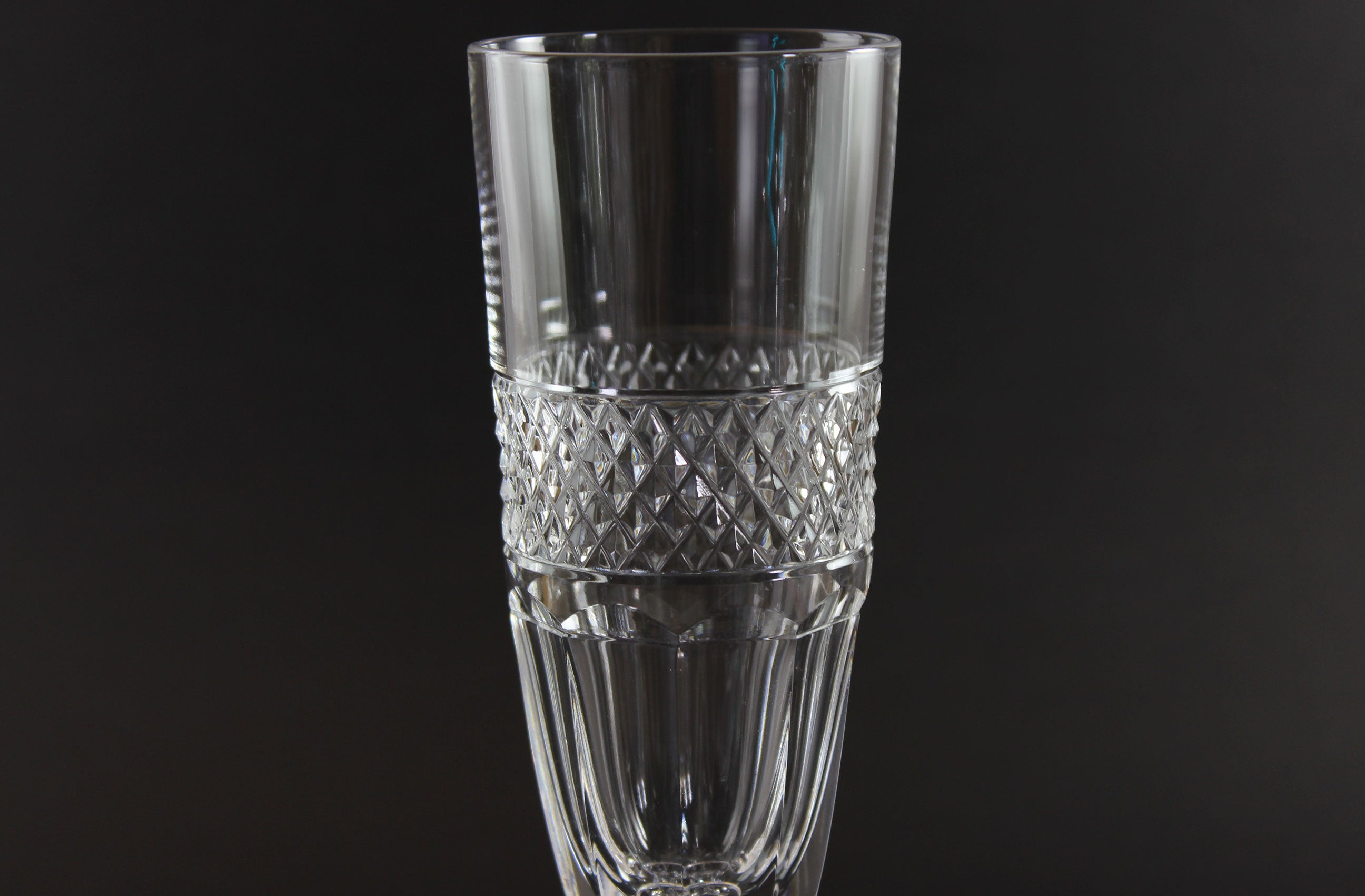 Clear crystal Champagne flute on a black background