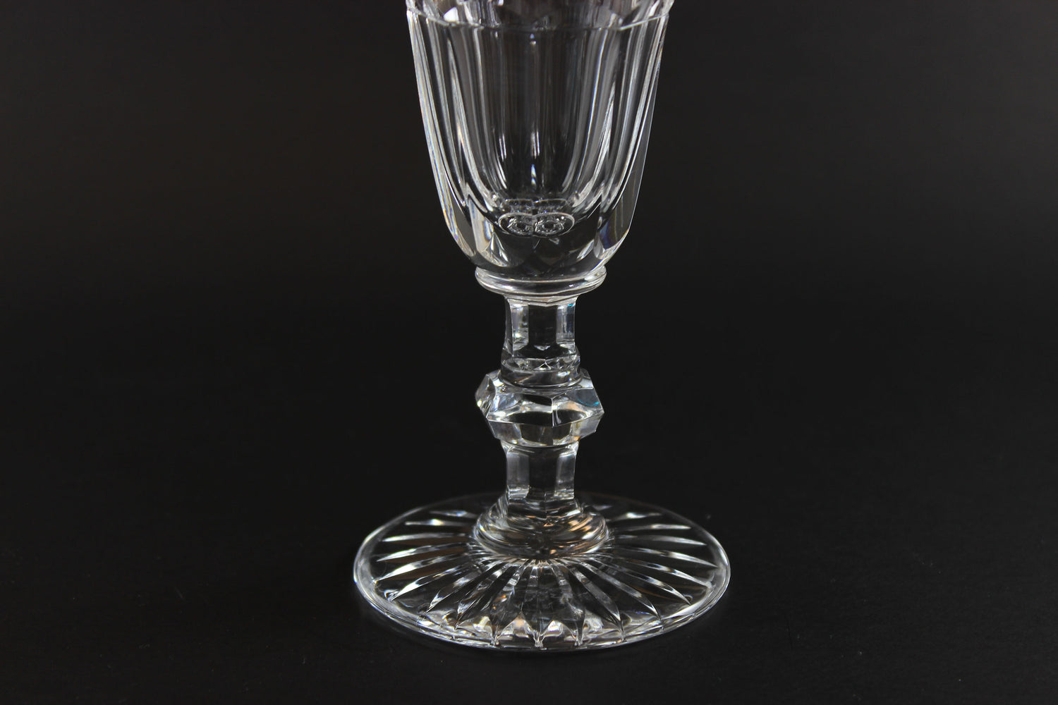 Clear crystal Champagne flute on a black background