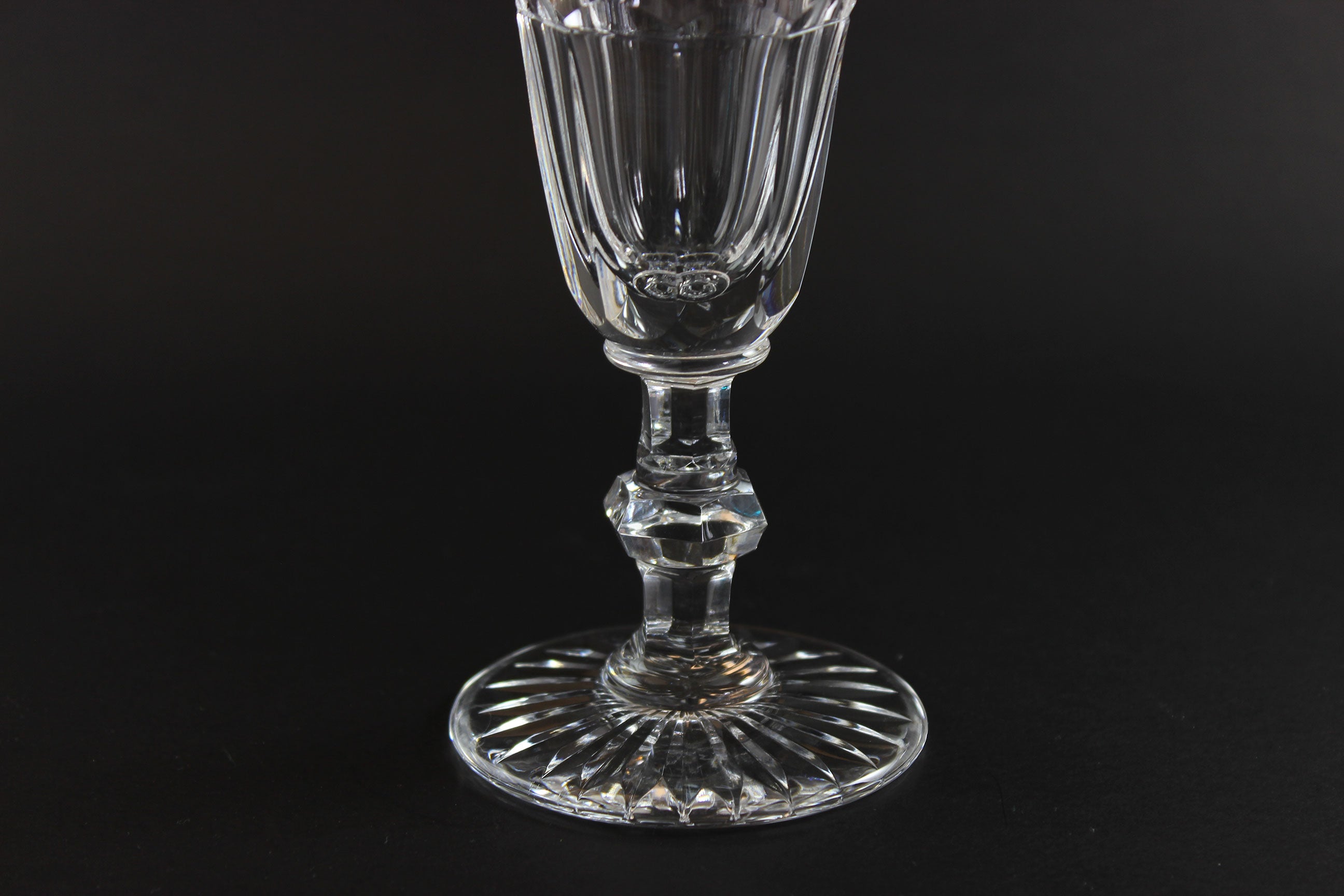 Clear crystal Champagne flute on a black background