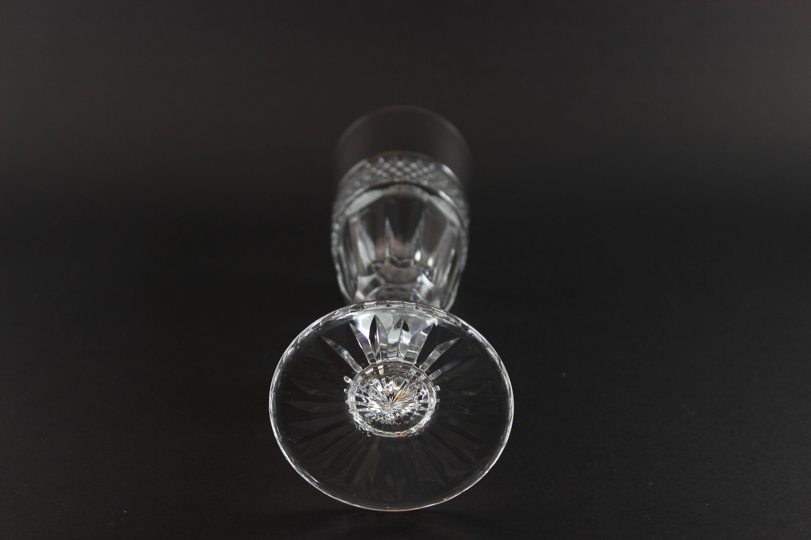 Clear crystal Champagne flute on a black background