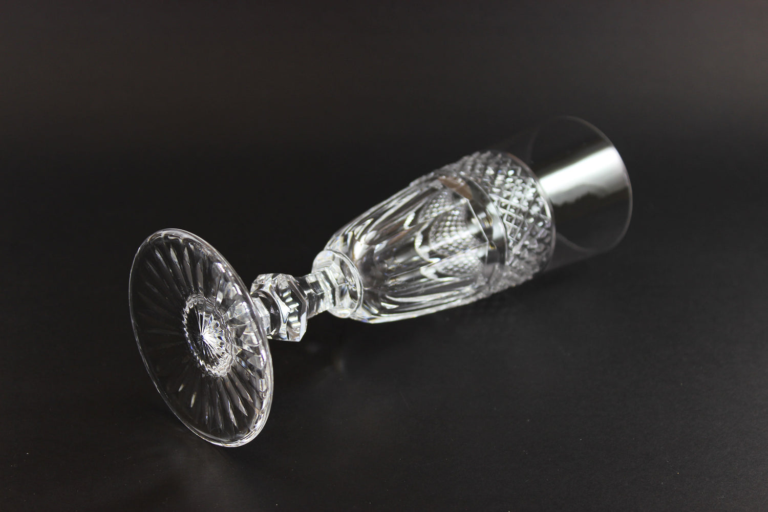Clear crystal Champagne flute on a black background