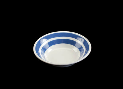 White ironstone cereal bowl with blue stripes in Cornishware style.