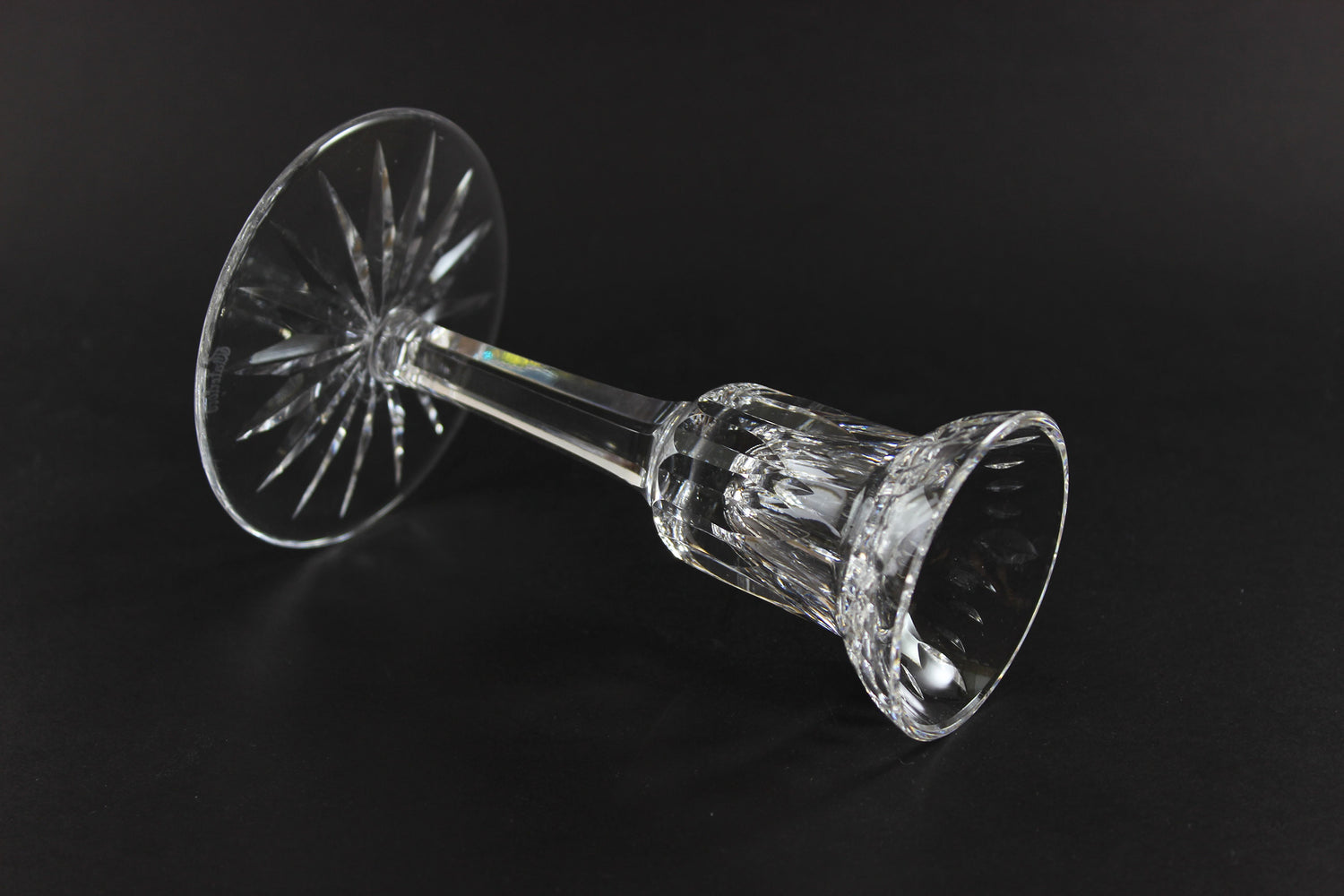 Clear crystal candlestick on a black background