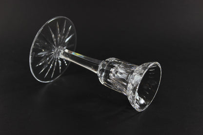 Clear crystal candlestick on a black background