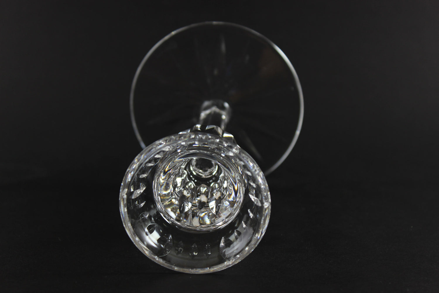 Clear crystal candlestick on a black background