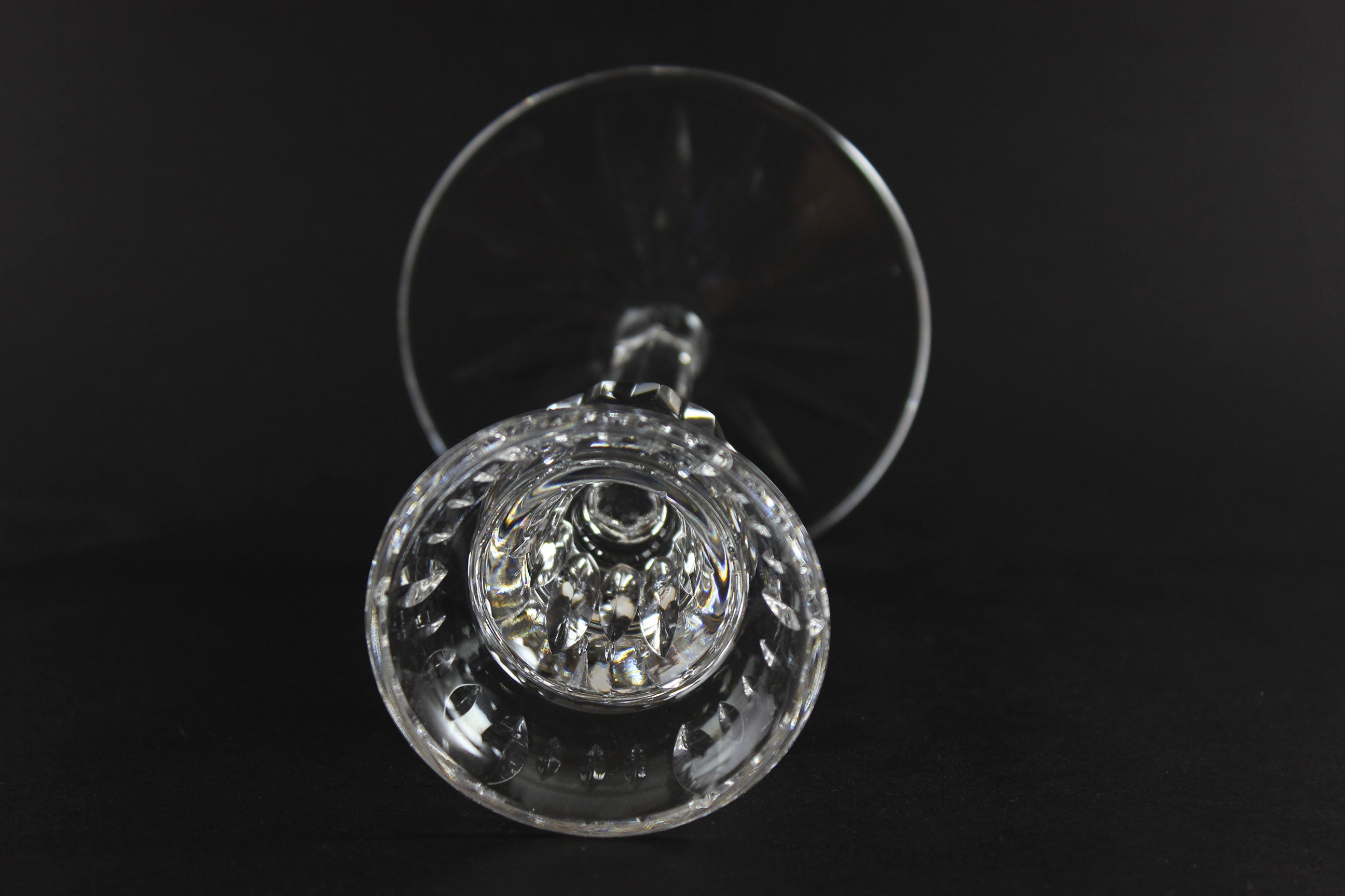 Clear crystal candlestick on a black background