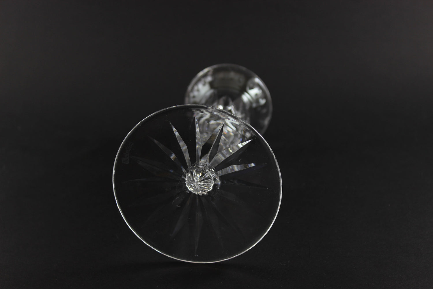 Clear crystal candlestick on a black background