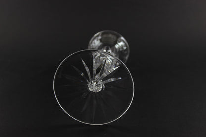Clear crystal candlestick on a black background