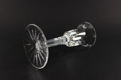 Clear crystal candlestick on a black background