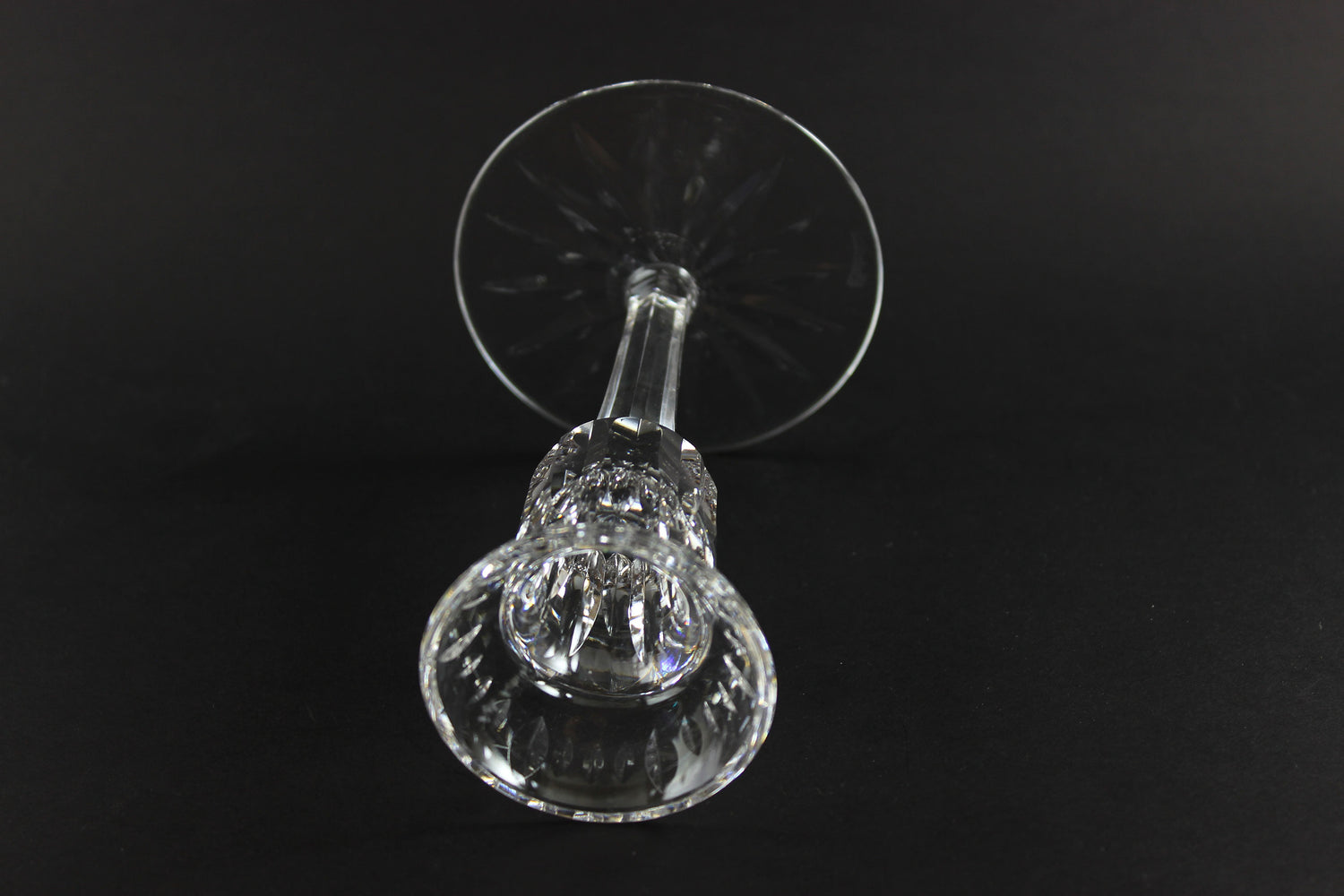 Clear crystal candlestick on a black background