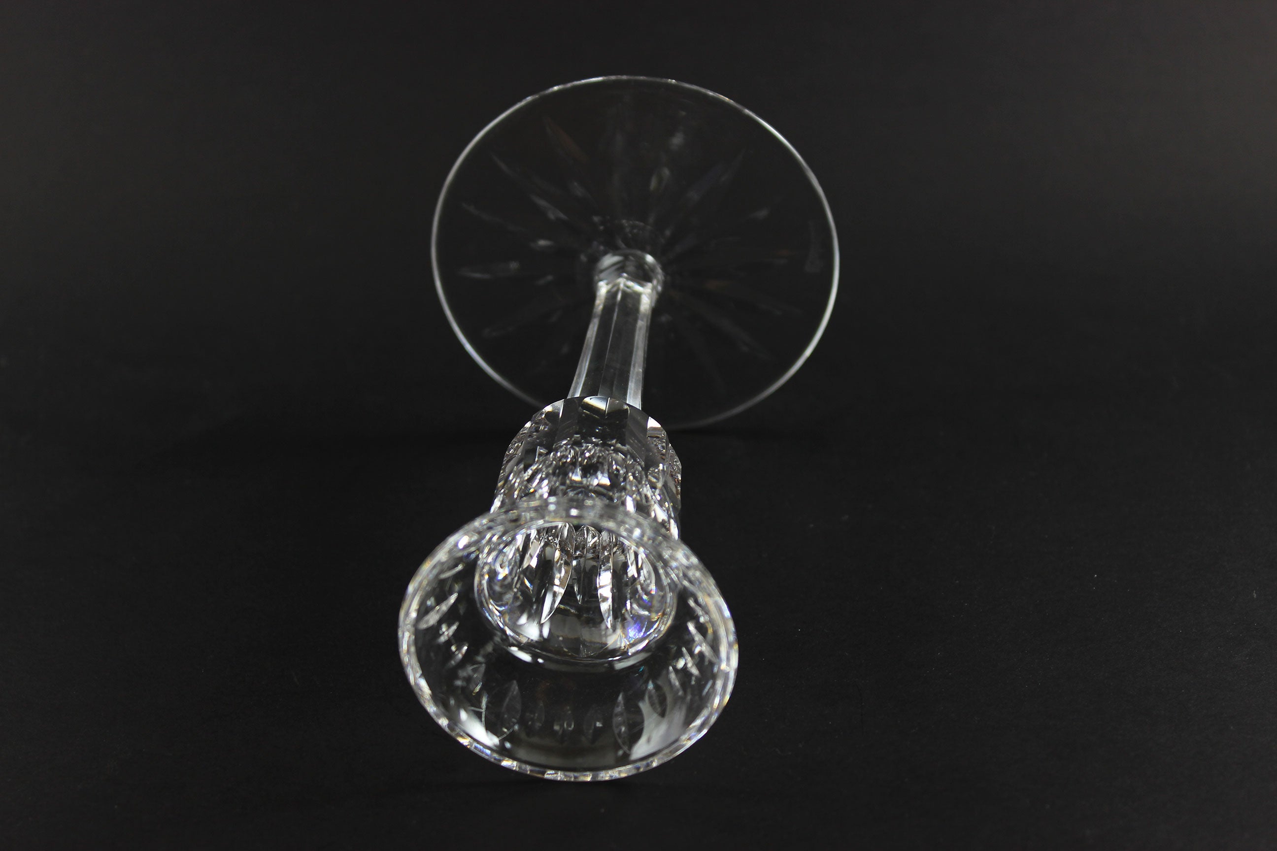 Clear crystal candlestick on a black background