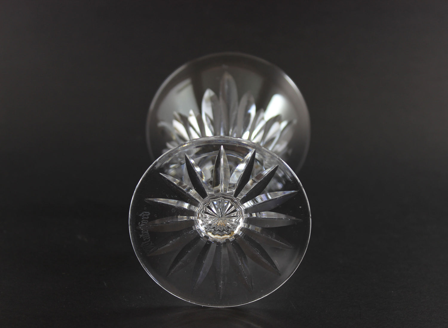 Cut crystal glass goblet on a black background