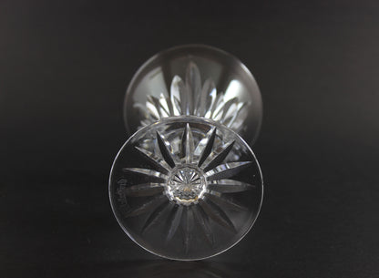 Cut crystal glass goblet on a black background
