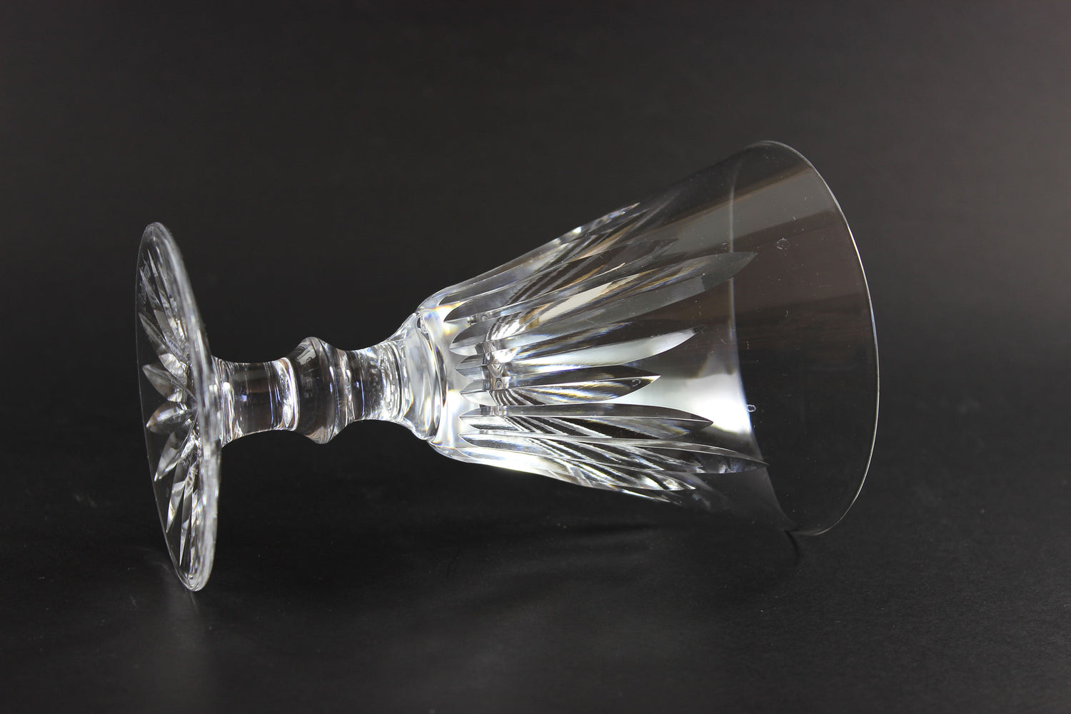 Cut crystal goblet on a black background