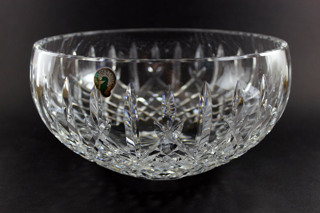 Waterford cut crystal bowl with intricate designs on a black background